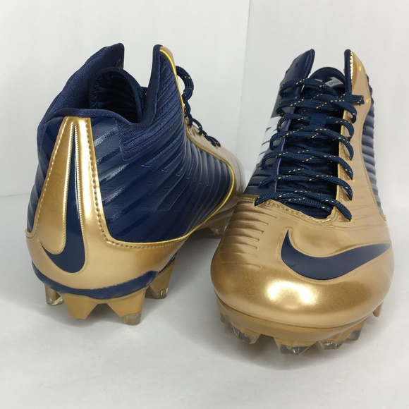 gold and navy blue football cleats